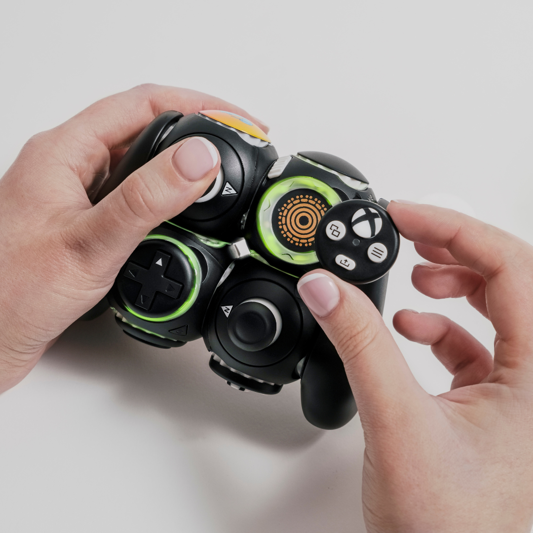 Proteus-Controller-in-two-hands-being-assembled